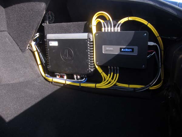 i was thinking about putting an aftermarket deck in my wifes 2001 escape xlt. i read somewhere that i may need an amp intergration harness? is.